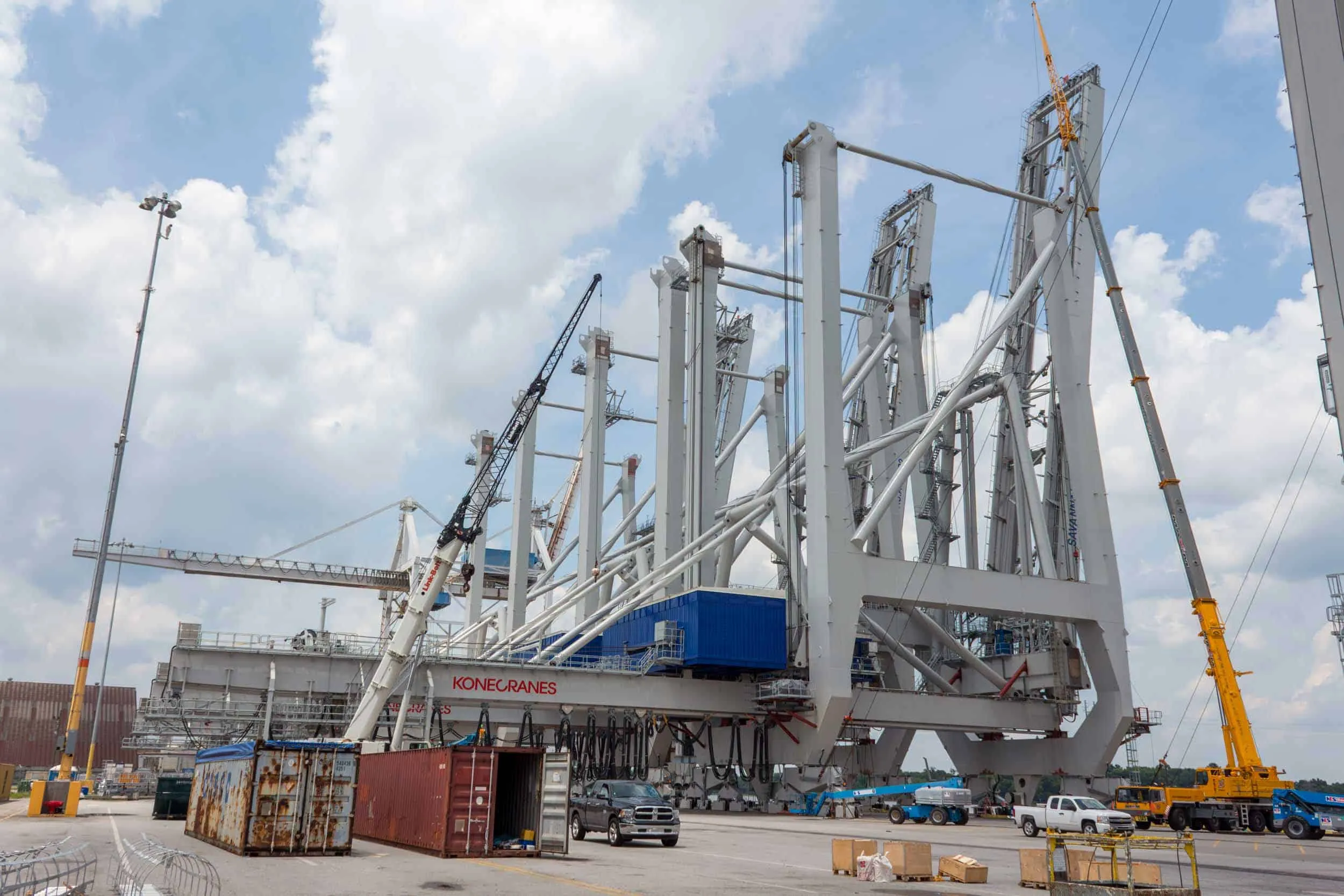 Gantry cranes at a shipping port construction site.